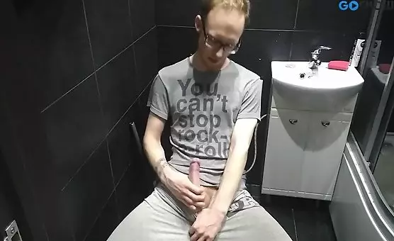 Handjob in a secluded bathroom